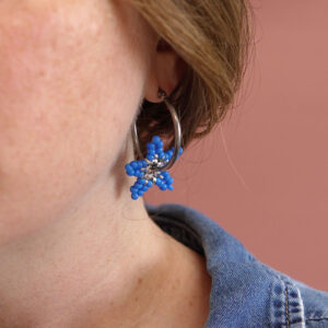 Boucles d'oreilles étoiles de mer en perles argentées.