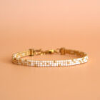 Bracelet fin en perles miyuki couleur dégradé doré et crème.