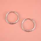 Créoles torsadées en acier inox argenté.